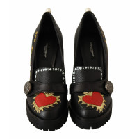 Dolce & Gabbana Pumps/Peeptoes aus Leder in Schwarz