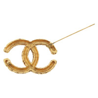Chanel Brooch in gold colors