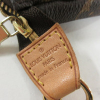 Louis Vuitton Mini Pochette Accessoires in Tela in Marrone