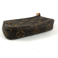 Louis Vuitton Mini Pochette Accessoires in Tela in Marrone