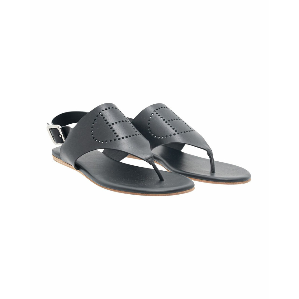 Hermès Sandalen aus Leder in Schwarz