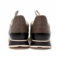 Hermès Sneakers aus Leder in Grau