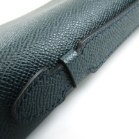 Givenchy Täschchen/Portemonnaie aus Leder in Grün