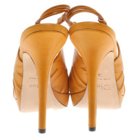 Christian Dior pumps in mustard yellow