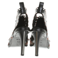 Louis Vuitton pumps in black and white