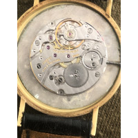Hermès Horloge Leer in Goud