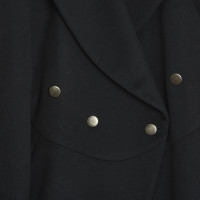 Alaïa Jacke/Mantel aus Wolle in Schwarz