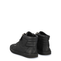 Chanel Chaussures de sport en Cuir en Noir