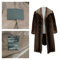 Prada Veste/Manteau en Fourrure en Marron