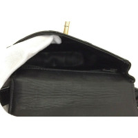 Chanel Belt Flap Bag aus Lackleder in Schwarz