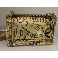 Chanel Boy Bag aus Leder in Gold