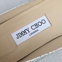 Jimmy Choo Slippers/Ballerina's Leer in Goud