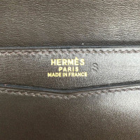 Hermès Clutch Leer in Bruin