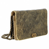 Chanel Clutch Leer in Goud