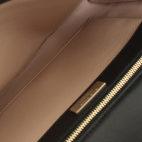 Elie Saab clutch with snake leather details