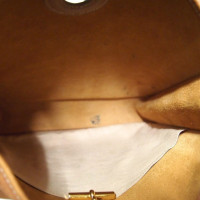 Hermès Vespa Leer in Goud