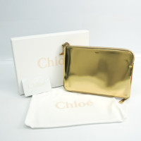 Chloé Clutch aus Lackleder in Gold