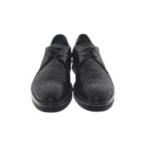 Tod's Chaussures à lacets en Cuir en Noir