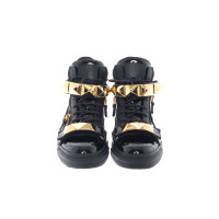 Giuseppe Zanotti Sneakers aus Lackleder in Schwarz