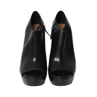 Alaïa Sandals Leather in Black