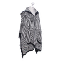 Closed Knitted poncho with pattern