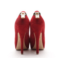 Louis Vuitton Pumps/Peeptoes Leather in Red