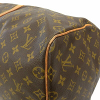 Louis Vuitton Keepall 55 in Tela in Marrone