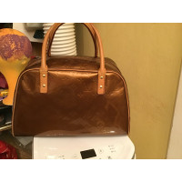 Louis Vuitton Tompkins Square Patent leather in Gold