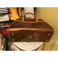 Louis Vuitton Tompkins Square Patent leather in Gold