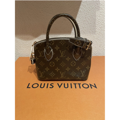 Louis Vuitton Lockit Leer in Bruin