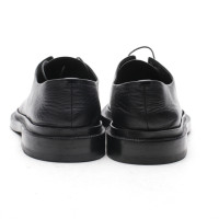 Jil Sander Chaussures à lacets en Cuir en Noir