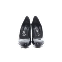 Pollini Pumps/Peeptoes Patent leather in Black