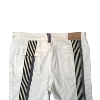 See By Chloé jeans bianchi con strisce