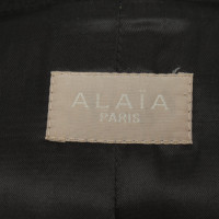 Alaïa Jacke/Mantel aus Wolle in Schwarz