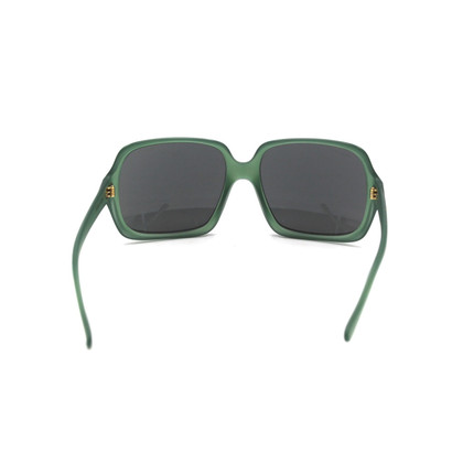 Miu Miu Sunglasses in Green