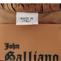 John Galliano In the plaid jacket 