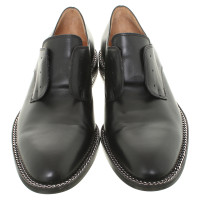 Givenchy Leather slippers in black