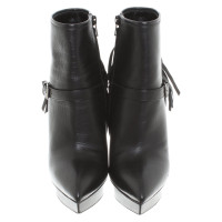 Saint Laurent Ankle boots with fringes