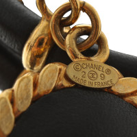 Chanel Bracciale con ciondoli logo 