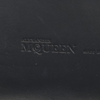 Alexander McQueen clutch with gemstone trimming