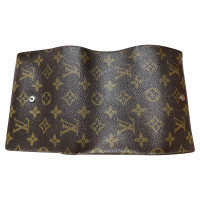 Louis Vuitton Sac à main/Portefeuille en Cuir