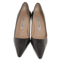 Manolo Blahnik Pumps/Peeptoes aus Leder in Schwarz