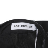 Self Portrait pantaloni di pelle imitazione in nero
