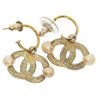 Chanel Gold colored logo earrings