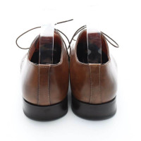 Santoni Chaussures à lacets en Cuir en Marron