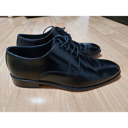 Lottusse Chaussures à lacets en Cuir en Noir