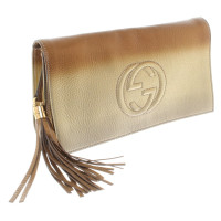 Gucci Goldfarbene Leder-Clutch