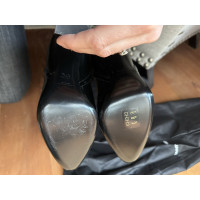 Saint Laurent Stiefel aus Lackleder in Schwarz