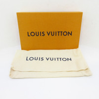 Louis Vuitton Emilie Canvas in Bruin