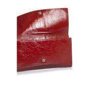 Yves Saint Laurent Clutch aus Leder in Rot